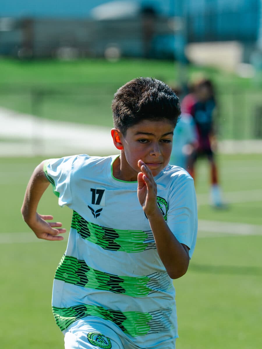 Apex United FC youth player focused during a match in San Antonio